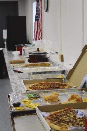 Community members donations, ordered food and contributions ensure the hospitality room at the Geary Invitational is full of good things for officials to eat and drink during the event