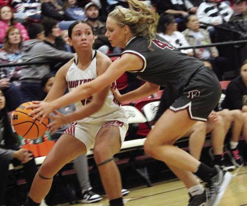 Above: The Watonga Lady Eagles played host to the Perry Maroons January 12, coming away with the win, 46-32. They next play at the