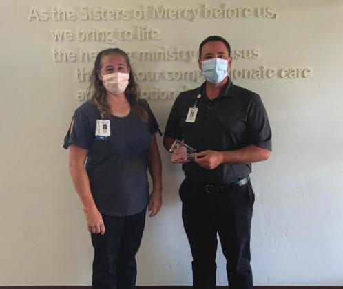 Jennifer Jackson and Kenny Thompson of Mercy Hospital accept an award for being Certified Healthy. (Photo provided by Taylor J. Shelton, Kingfisher County Health Department)