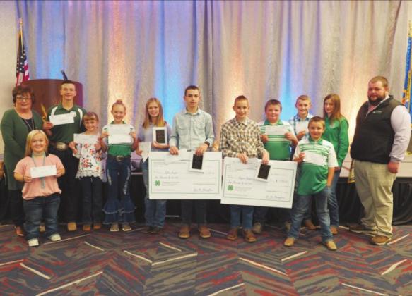 Back row: Becky Bedwell, Blaine County OSU Extension Educator; Bryer Roberts, Baylea Robison, Logan Chance, Jayce Shultz, Tyler Sawyer, Bryson Sawyer, Landon Poe, Grant Robison, Avery Fisher, Karl Riffle, Okeene Vocational Agriculture Instructor; Front row: Bryn Roberts and Luke Poe. Not picture was 4-H member Caton Cope.
