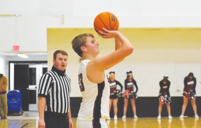 Tucker Estep goes for the shot during a scrimmage against Amber-Pocasset. (Photo provided by Brenda Lee Geels)