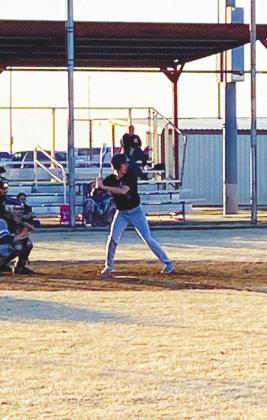 Andrew Salmi I Watonga Republican (Above) Watonga High School varsity baseball junior Joe Rinehart (left) and sophomore Josh Wickware (right) each compete on Monday, March 2 during the Eagles’ 2020 season opener at home against Amber-Pocasset High School.