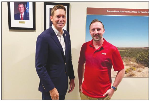 Watonga Republican editor Graham Dudley (right) poses with Oklahoma Lt. Gov. Matt Pinnell. Pinnell was at Roman Nose State Park last Wednesday, Sept. 15 for a meeting of state tourism advisors.