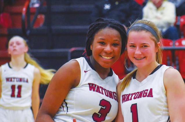 Abby Boeckman (right) poses with her teammate Mary Barton (left) during a game. Photo provided by Brenda Lee Geels