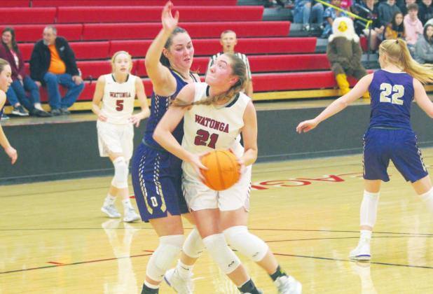 Former Watonga High School Lady Eagles' standout forward Cacie Gorman (21) attempts to score in the paint on Dec. 3, 2019, during a game vs. Okarche High School. Gorman will continue her basketball career 2020-21 season when she plays women's basketball at Univeristy of Arkansas - Fort Smith. Andrew Salmi | Watonga Republican