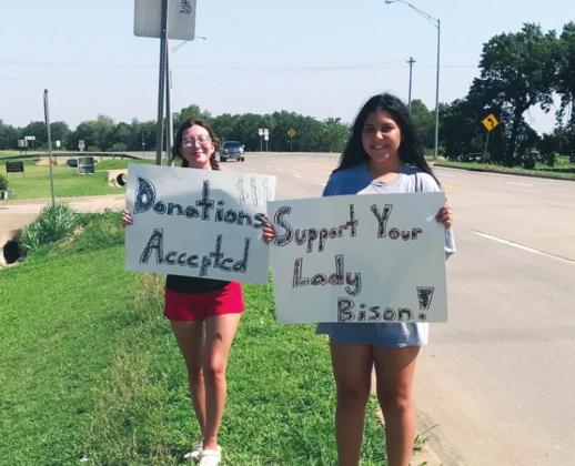 Lady Bison Softball Holds Car Wash Fundraiser