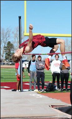 Above: Nick Walker shows good form at the high jump