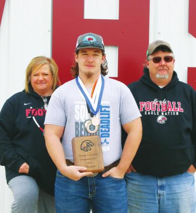 Watonga High School varsity powerlifting 242-pound junior Kerby Easter with his parents Christy and Jerry Easter. Kerby was a state qualifier for the Eagles alongside Wiggins.