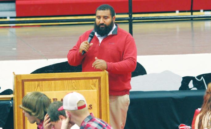 Geary High School varsity football head coach Steven Wilson talks to students, parents, and faculty on May 9, 2019, during last year’s Bison All-Sports Banquet award ceremony. On Monday night at the Geary Public Schools Board of Education meeting, it was officially announced that Wilson had resigned from his position after six years at the helm of the Bison football program. Andrew Salmi The Geary Star