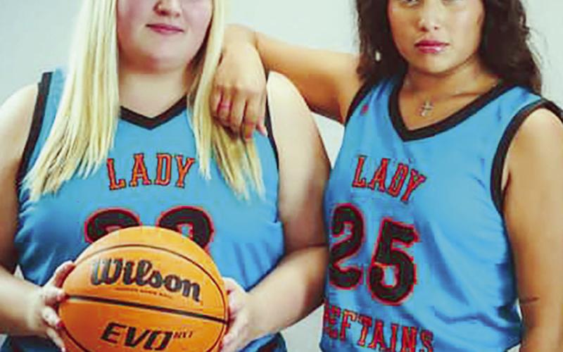 Calumet senior basketball players don the turquoise uniforms provided through a partnership with Nike in honor of Native American heritage and culture. Calumet is one of 270 schools, communities and organizations to benefit from the program