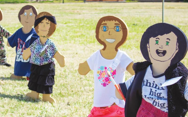 Smiling Faces Crowd the Courthouse Lawn this Month