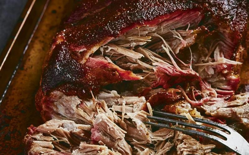 Smoked pork butt and all the trimmings are on the menu for the annual Lions Club Feed and cake auction.
