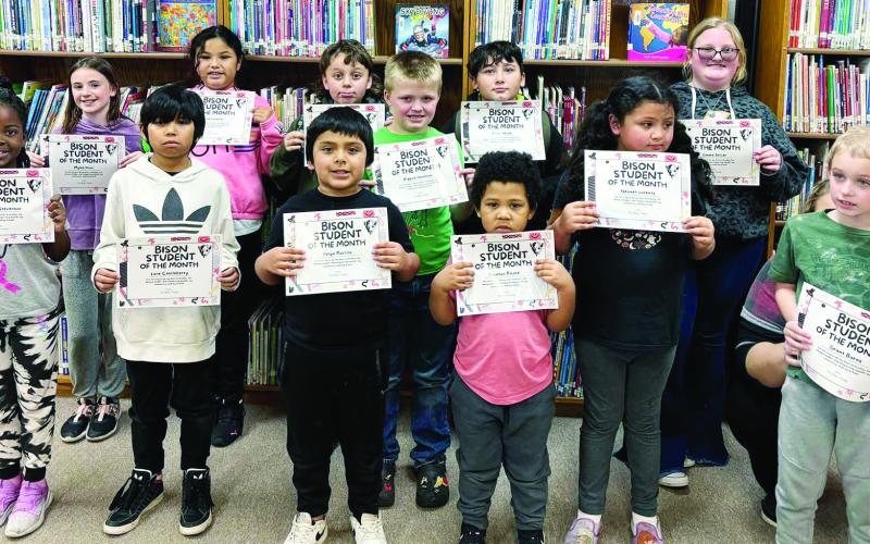 Above: Bison Elementary School Students of the month. Below, Left: Jaiden Woods and Rylan Peralta showing their awards from the SWOSU Shootout at Weatherford. Below at right: Randi Upchego, Rosie Pineta, Aubrey Lawson and Tonya Olsen with their awards as well.
