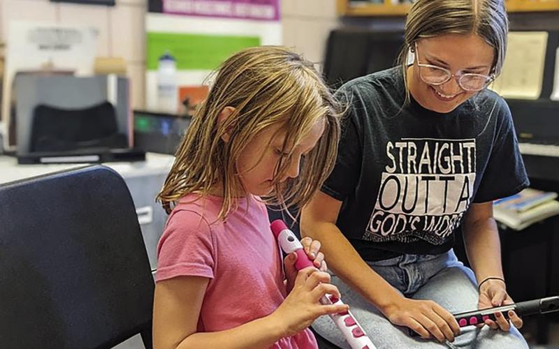 SWOSU Music Academy Junior Faculty member, Destyne Anderson, teaching flute lessons to a student enrolled in private lessons.