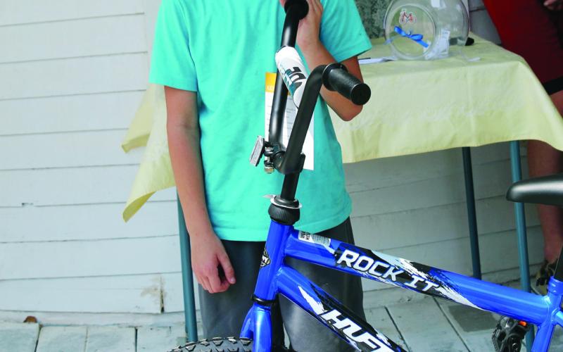 Bike Winner Dylan Ford was the winner Saturday of the boy’s bicycle at the Ferguson Home Museum event. In addition, he will also recieve a helmet.
