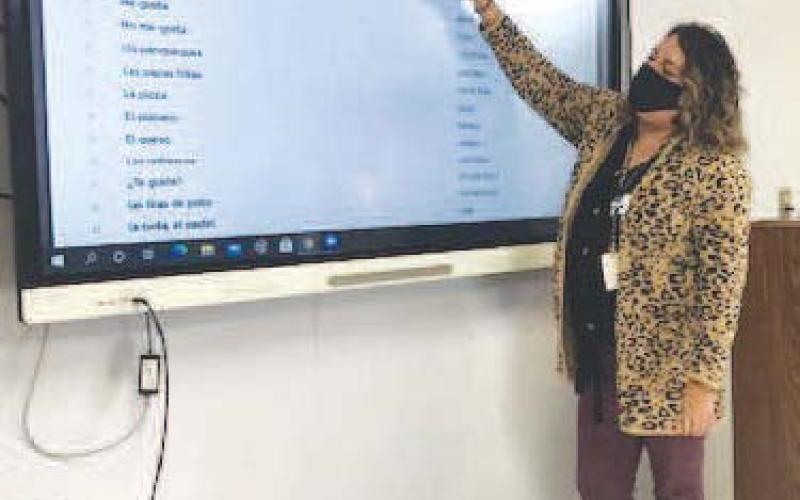 Geary Spanish teacher Karen Stein uses her world experience to teach language to middle-schoolers at Geary Middle School.