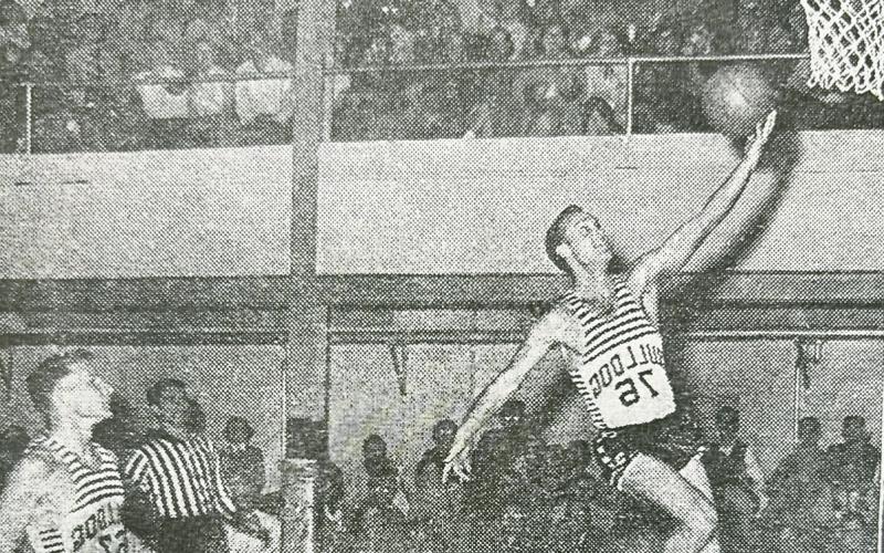 Walter Montgomery scores on a fast break almost the length of the court after he had stolen the ball from two OBU cagers, with Bill Davis following won close behind for insurance. The Bulldogs 86-78. Photo courtesy Montgomery family