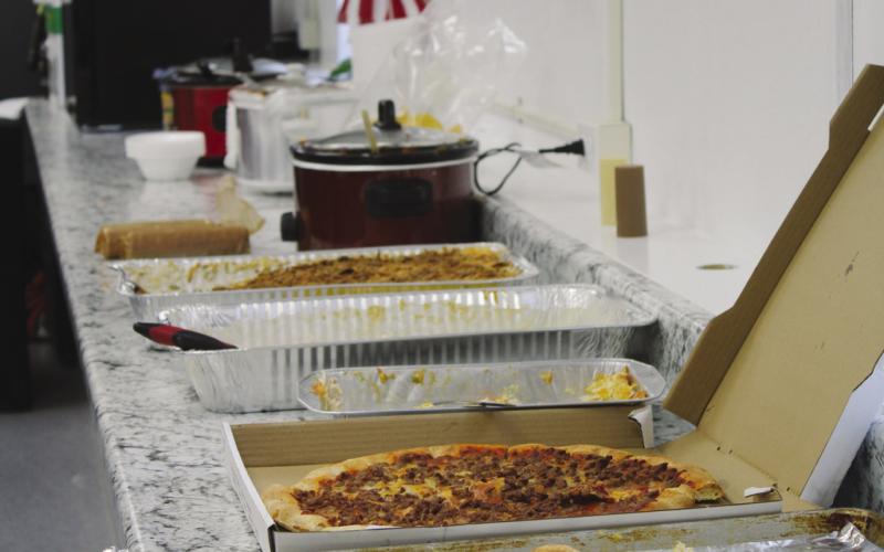 Community members donations, ordered food and contributions ensure the hospitality room at the Geary Invitational is full of good things for officials to eat and drink during the event