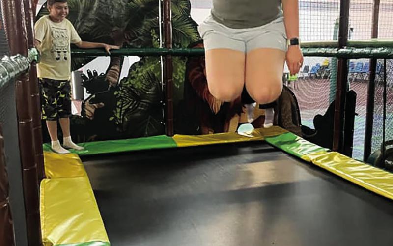 ( ABOVE) Summer school students are having more fun at Geary schools than the law allows. When they aren’t working on STEM activities presented in a way that makes learning outstanding (AT LEFT) they are up in the air over new skills or ( AT RIGHT) making hands on discoveries about