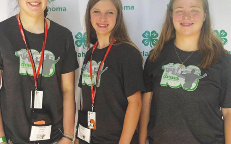 Caton Cope (far right) of Watonga was recognized for being in the top three with her Recreation and Leisure Arts 4-H Record Book.