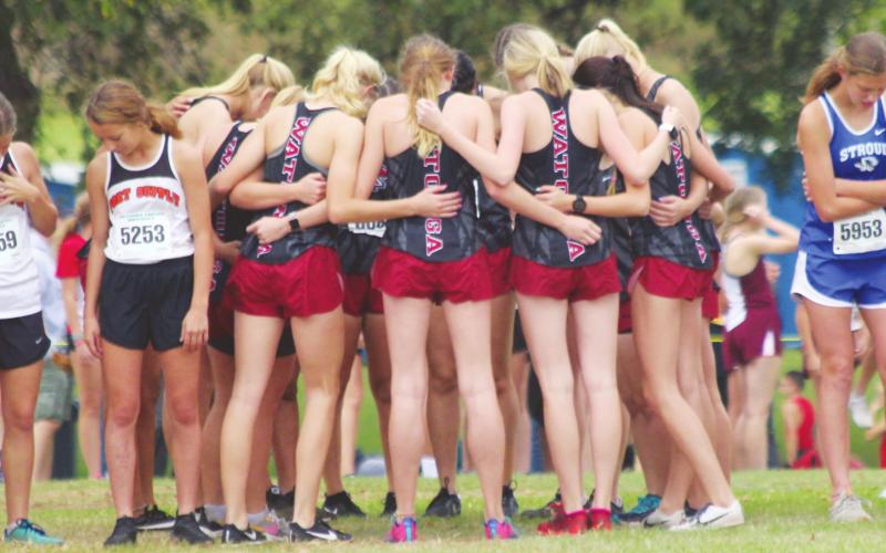 Photos by Andrew Salmi Watonga Republican The Watonga High School girls’ varsity cross country team huddles together on Oct. 3, 2019 prior to the Oklahoma Baptist University Pre-State Challenge held in Shawnee. With this week’s news that all Oklahoma school will be closed until at least April 6, Watonga Eagles’ and Lady Eagles’ athletics for the spring 2020 season have been suspended until further notice.