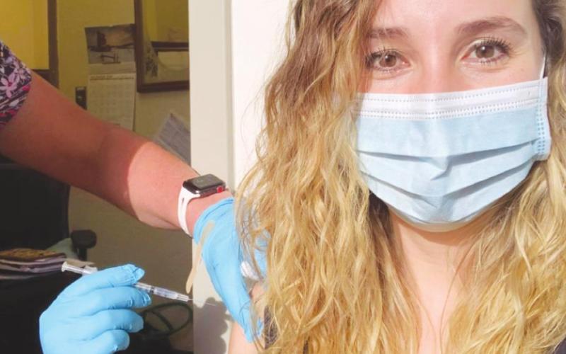 Registered nurse Casandra Oakes receives her first dose of the COVID vaccine. (Photo Provided)