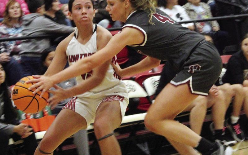 Above: The Watonga Lady Eagles played host to the Perry Maroons January 12, coming away with the win, 46-32. They next play at the