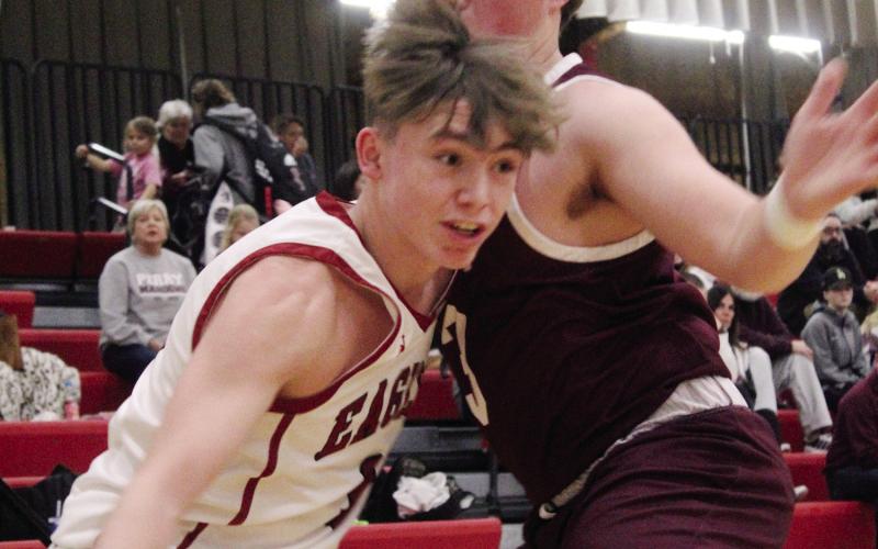 Pendergraft takes command of the ball and heads to the hoop.