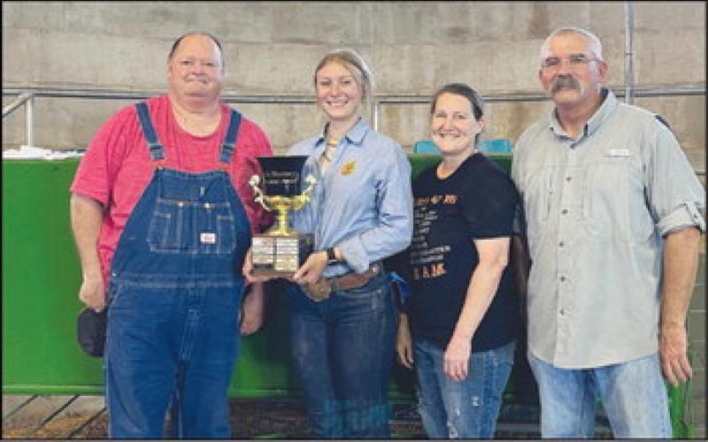 Pictured with Amanda is Don Mitchell, Canton ag teacher, and her parents James and Melinda Schoonmaker.
