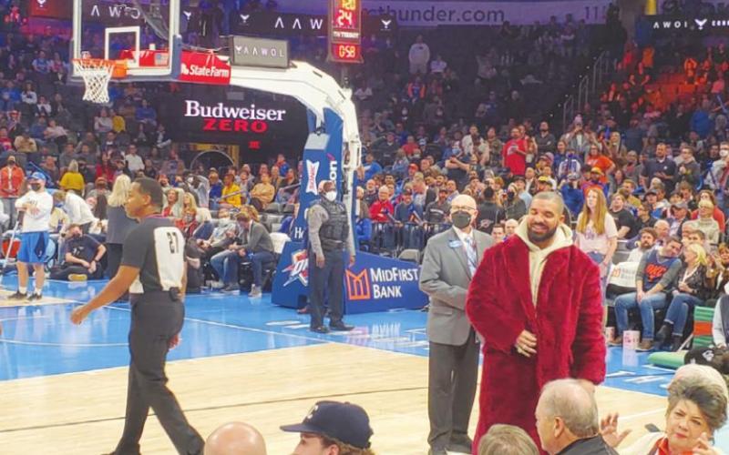 Drake stands courtside during a game at the Paycom Center on Wednesday, Dec. 1. (Photo: Scotty Maxwell)