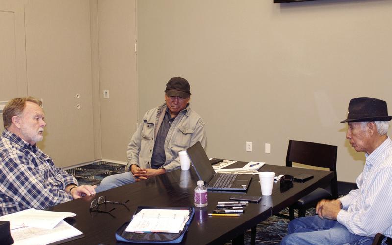 Artist and sculptor Lew Aytes (L) came to Watonga to meet with Melvin Roman Nose (C) and Larry Roman Nose (R) descendants of Henry Roman Nose for an upcoming work of art