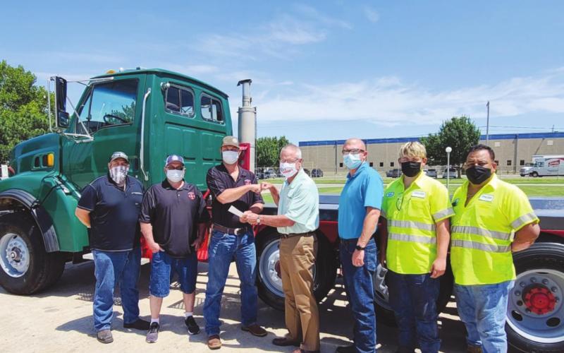 Left to Right: Rey Caster, Dolese; Gary Martin and Kelby Scott, Canton Fire Department; Kermit Frank, Brian Malatka, Jaykob Malatka and Felipe Flores, Dolese. Dolese Bros. Co. | Watonga Republican