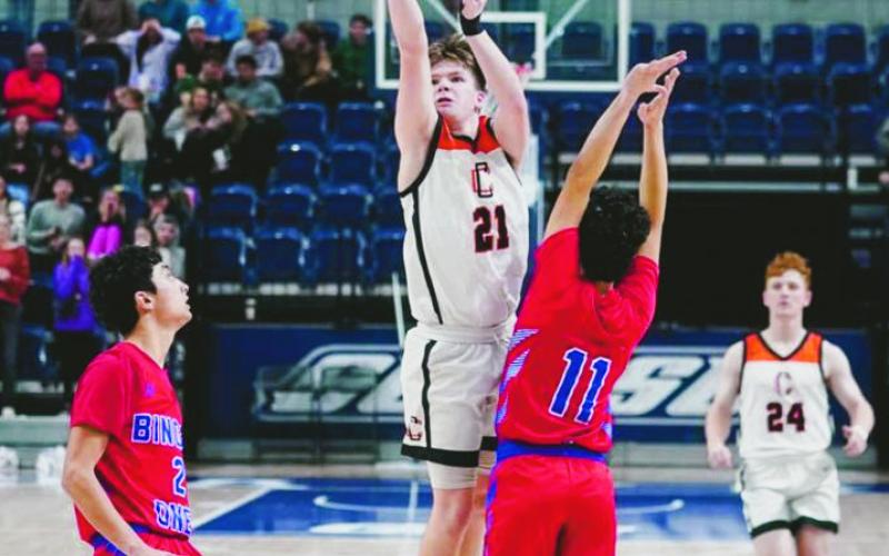 (AT LEFT) Almost one year ago, Kingston Arnold drained a buzzerbeating three pointer to lift the Chieftains over Binger-Oney 54-52 for the Washita Valley Conference Championship. Photo courtesy Dillon Young