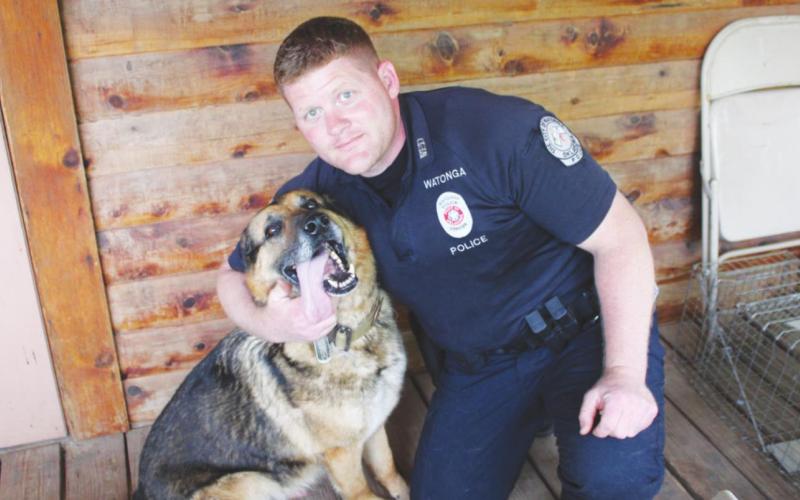 Officer Shawn Kays poses with K-9 Officer Mate in this file photo from May 2021.