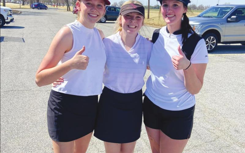 Mason Estep, Calista Riley and Kaylee Roberts competed Monday at a golf tournament in Enid.