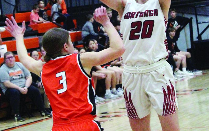 The Watonga Lady Eagles were victorious over host Fairview in the first round of regional play Friday,44-42 to advance to Saturday play, where they met and lost to Hooker, 51-39, ending a stellar season. Photos from the game with Fairview, from left: Aubrey Bridges makes a jump shot. At center: Mary Barton-Hodges sets up for a basekt. At right Jaidon Turney gains two points to tie the game in the last quarter. The Lady Eagles pulled ahead to win with only seconds remaining.