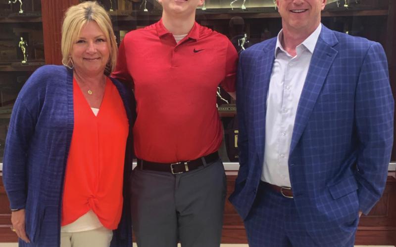 Tucker Estep poses with Kimbri High and Terry Cupp at the Watonga scholarship and awarsd banquet on Monday, May 3. The scholarship was created in memory of Doris Cupp, a longtime Watonga High School educator.