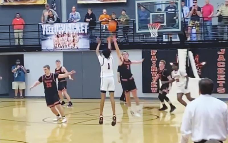 Devon Wilson shoots his game-winning shot seconds before the buzzer.