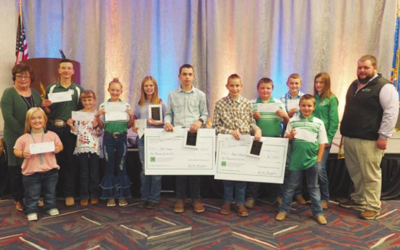 Back row: Becky Bedwell, Blaine County OSU Extension Educator; Bryer Roberts, Baylea Robison, Logan Chance, Jayce Shultz, Tyler Sawyer, Bryson Sawyer, Landon Poe, Grant Robison, Avery Fisher, Karl Riffle, Okeene Vocational Agriculture Instructor; Front row: Bryn Roberts and Luke Poe. Not picture was 4-H member Caton Cope.