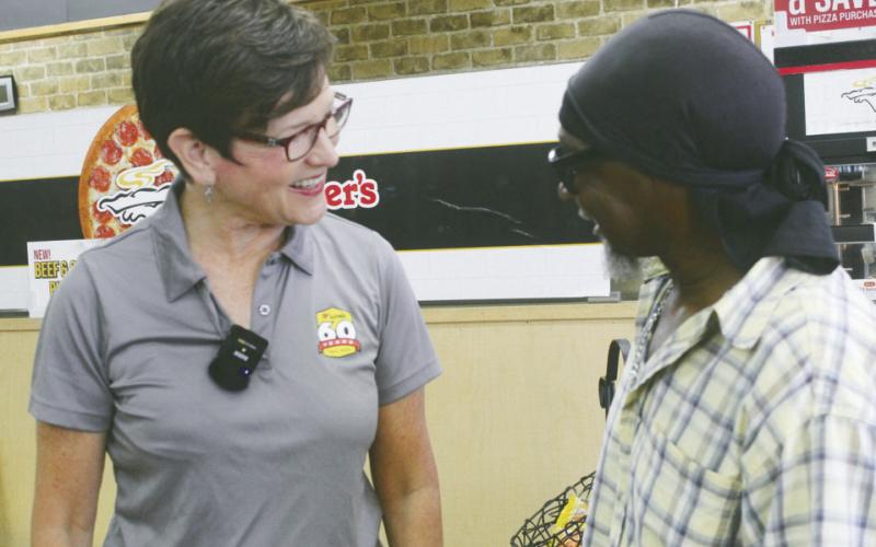 Jenny Love Meyer made a special trip to Watonga to hand out gift cards to customers at Store #1 to celebrate 60 years in business.