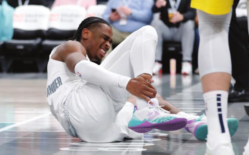 Oklahoma City Thunder guard Shai Gilgeous-Alexander grabs his ankle after a play against the Indiana Pacers during the second half at Paycom Center. Indiana won 113-110 in overtime. (Alonzo Adams-USA TODAY Sports)