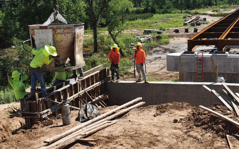 Employees of OBC continue their work on the Pony Bridge reconstruction over the Canadian River on historic Route 66 between Geary and Hinton.