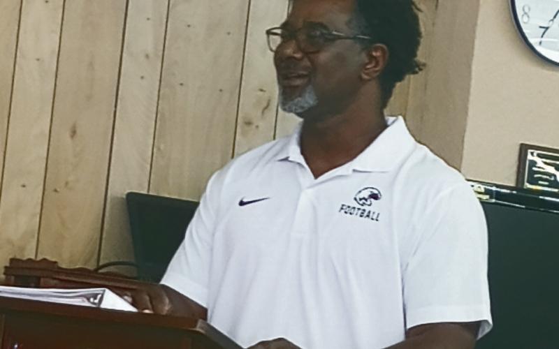 Greg Johnson talks football at the Watonga Kiwanis Club, telling Eagle fans to get ready for a new set of glory days..