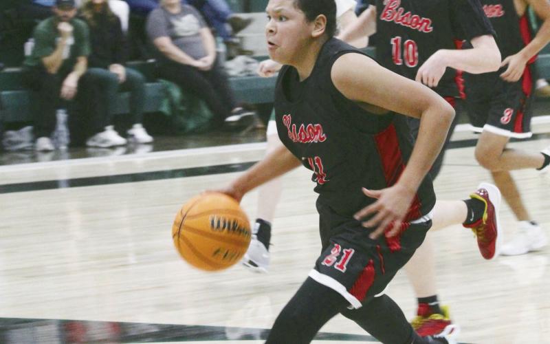 Basketball Falls to Thomas on the Road