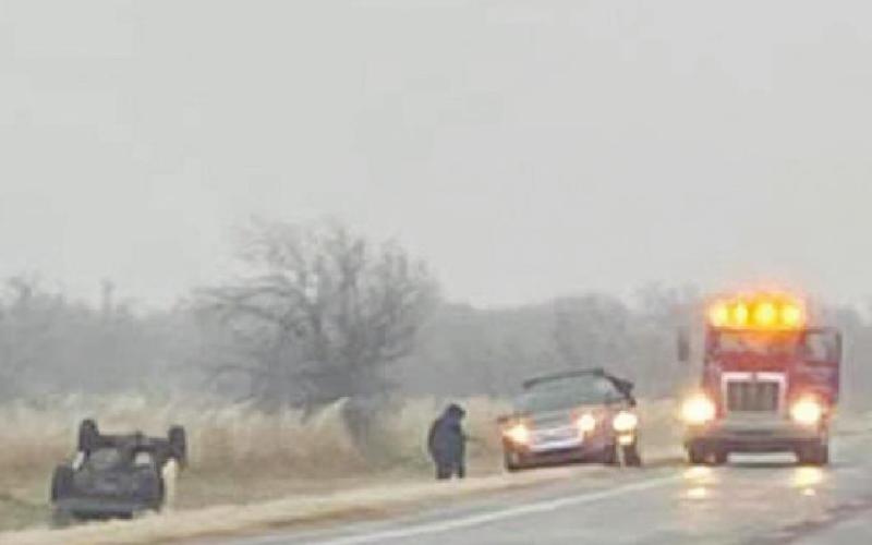 Above: Flipped over car awaiting assistance from tow truck on road between Watonga and Kingfisher.