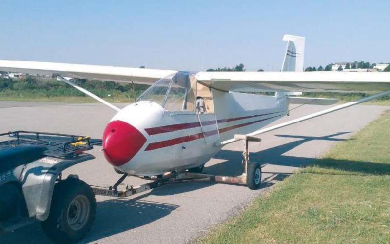One of the OSA club-owned gliders as it is being moved to its temporary home at the Watonga Airport. While the tarmac at the Hinton Airport is undergoing a facelift, the club is operating out of Watonga, where residents can go out, watch the gliders take off and land, and perhaps sign up for an introductory flight. Lane Edsall Watonga Republican
