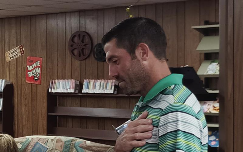 Crawford Officially Checks Out of Library