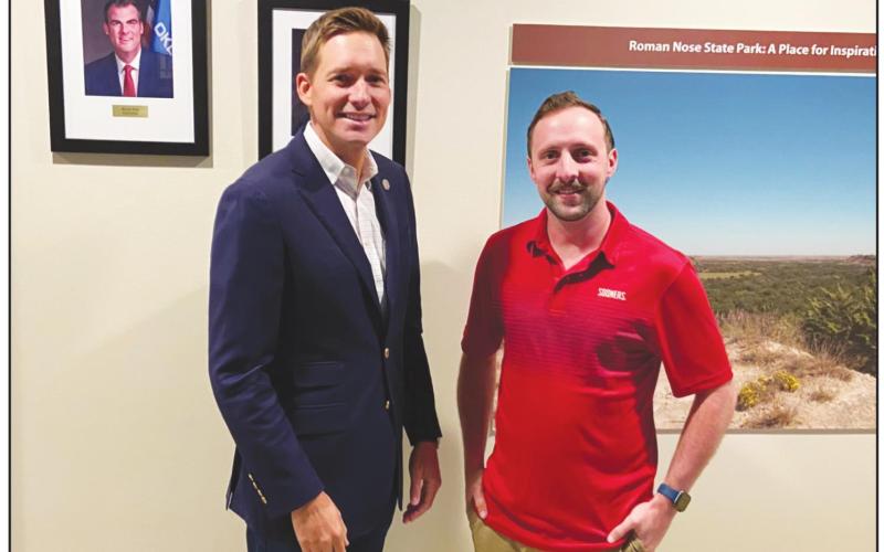 Watonga Republican editor Graham Dudley (right) poses with Oklahoma Lt. Gov. Matt Pinnell. Pinnell was at Roman Nose State Park last Wednesday, Sept. 15 for a meeting of state tourism advisors.
