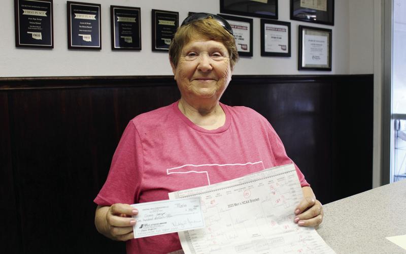 Bracket Bucks Connie George was the winner of the Watonga Republican’s college basketball bracket contest. She stopped by the office recently to pick up her prize. She said she was as surprised as anyone that UConn had won the championship, but her picks were the closest of those entered in the contest.