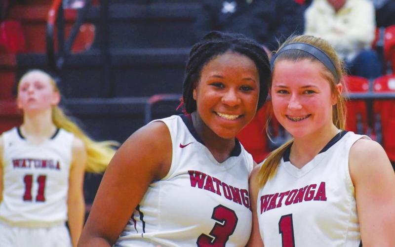 Abby Boeckman (right) poses with her teammate Mary Barton (left) during a game. Photo provided by Brenda Lee Geels
